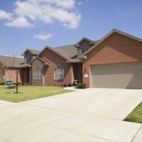 Change the frequency switch settings on the motor and your remote control if your remote opens your neighbors' garage doors.