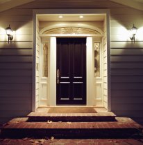 Elegant dark front door to home