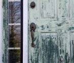 First steps in repainting an exterior metal door