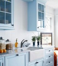 painted blue cabinets orb hardware bhg