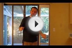 Installing a spring loaded sliding glass pet door panel